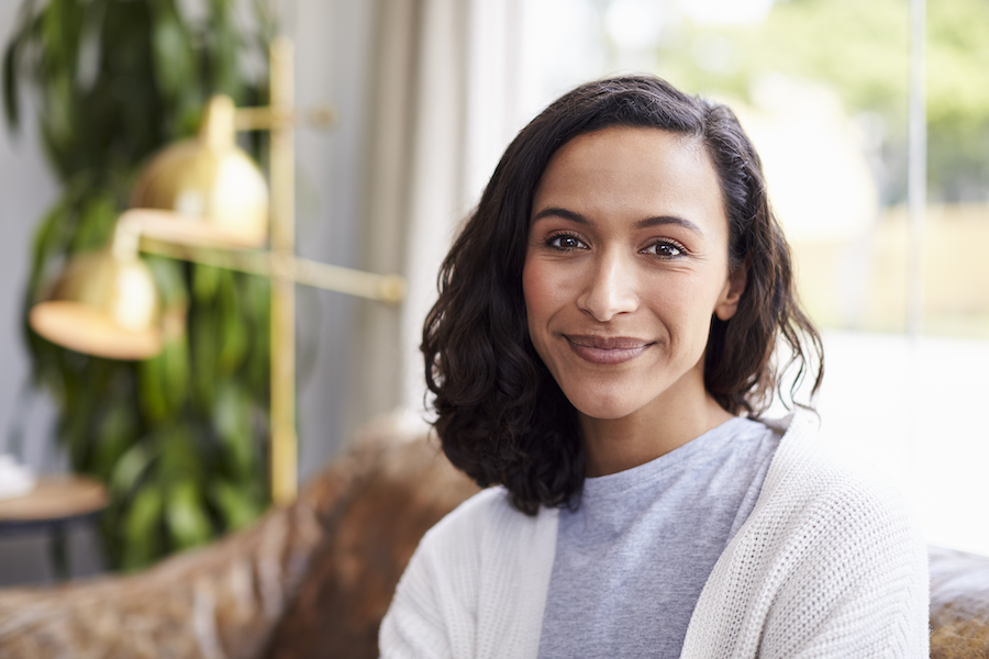 Woman sitting on couch